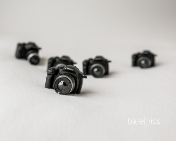 Titt tei minikamera til nyfødtfoto
